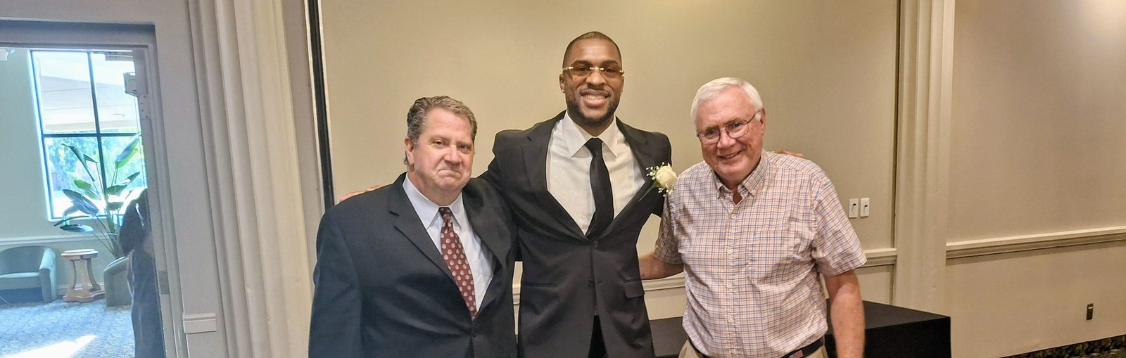 Allen Robinson II shares the occasion of his induction into the CHSL Hall of Fame with his St. Mary’s Prep coaches, Len Karschnia on the left, in basketball, and Hall of Fame Legend George Porritt in football.