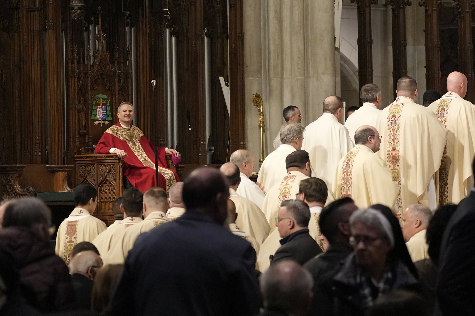 Archbishop Ronald A. Hicks looks on as priests enter the sanctuary to receive Communion during his installation Mass as the new archbishop of New York at St. Patrick's Cathedral in New York City Feb. 6, 2026. (OSV News photo/Gregory A. Shemitz)