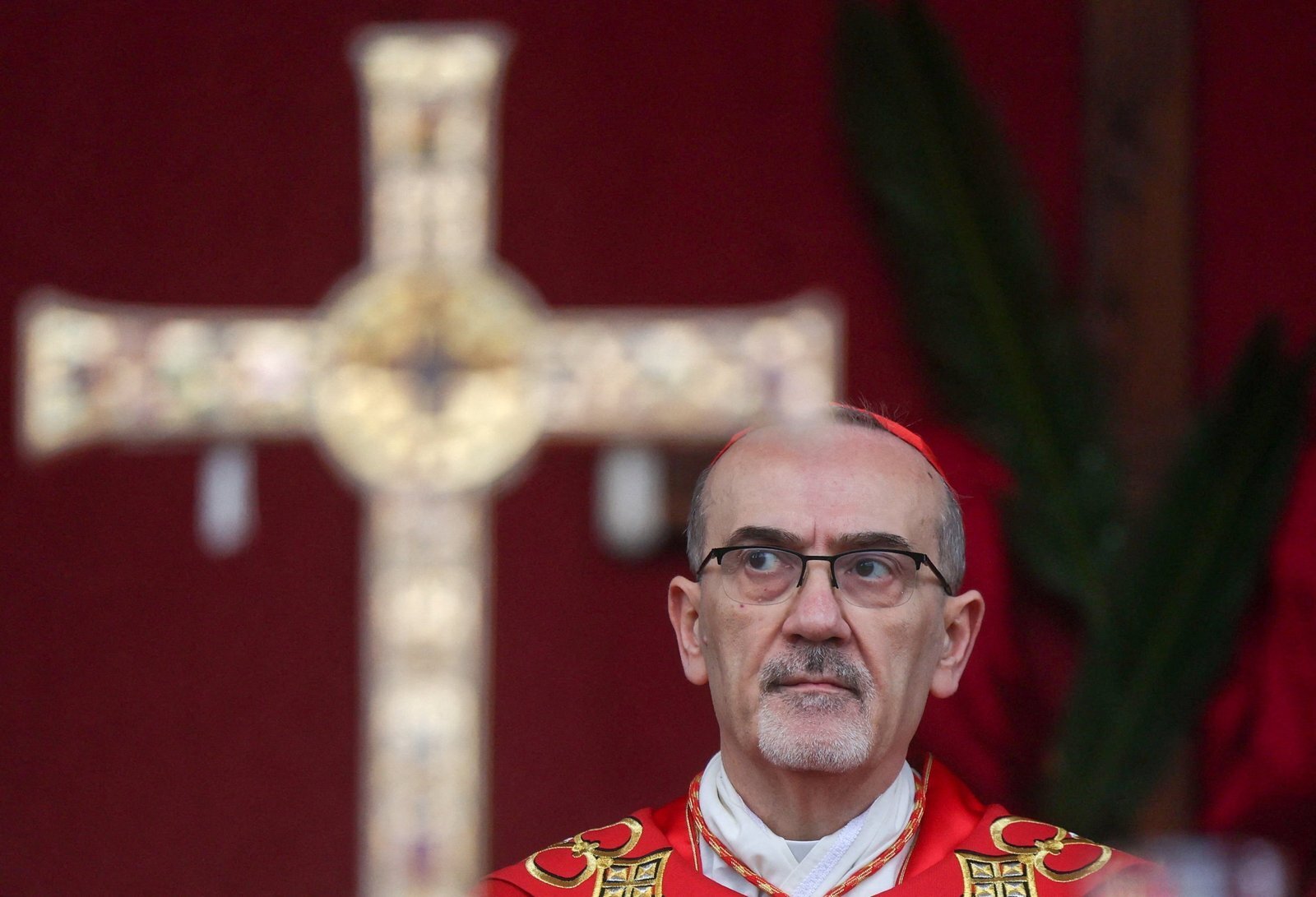 El cardenal Pierbattista Pizzaballa, patriarca latino de Jerusalén, celebra un servicio de oración para conmemorar el Domingo de Ramos, tras la cancelación de la tradicional procesión del Domingo de Ramos desde el Monte de los Olivos, en medio de las restricciones a las reuniones de grandes grupos y la guerra de Estados Unidos e Israel contra Irán, en Jerusalén, el 29 de marzo de 2026. (Foto OSV News/Ammar Awad, pool vía Reuters)
