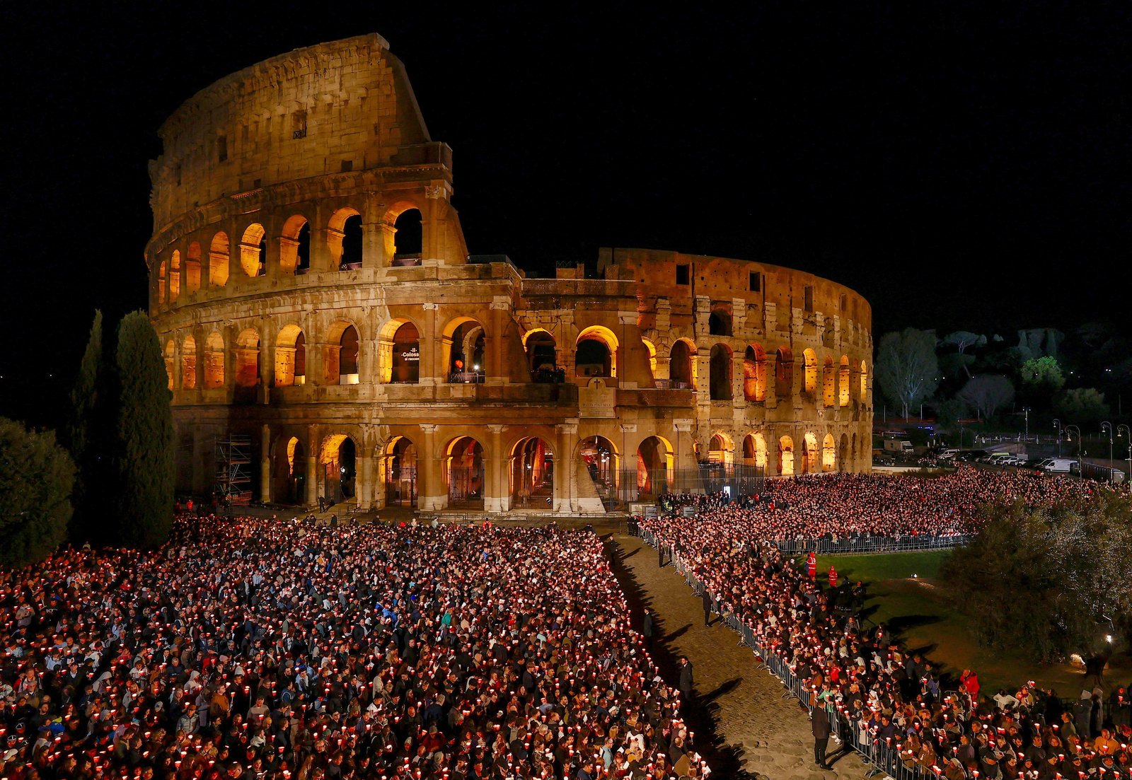 Large crowds gather as they wait for Pope Leo XVI to lead the Way of the Cross at the Colosseum in Rome April 3, 2026. (OSV News photo/Vincenzo Livieri, Reuters)