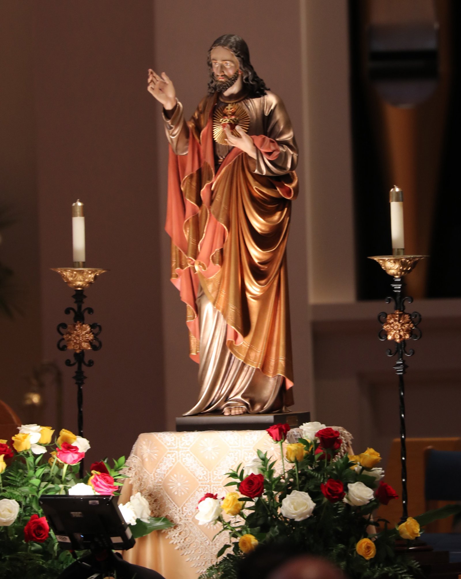 A statue of the Sacred Heart of Jesus is displayed before the U.S. Catholic bishops consecrate the country to the Sacred Heart of Jesus at the Basilica of Mary Queen of the Universe in Orlando, Fla., June 11, 2026, during their spring plenary assembly. (OSV News photo/Bob Roller)