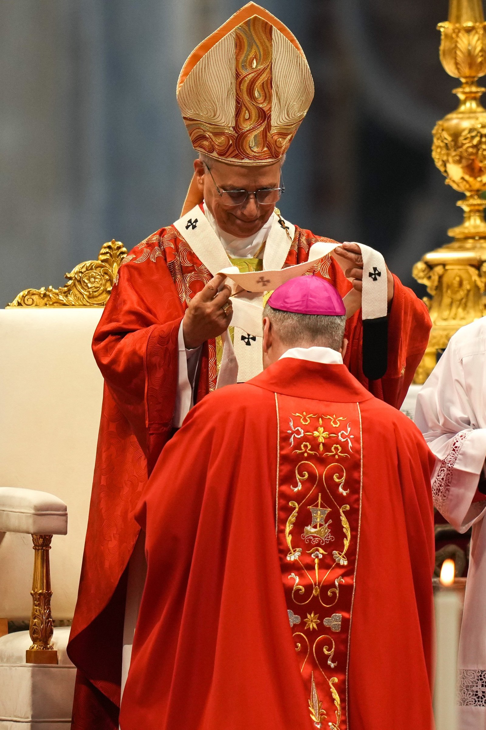 Archbishop Ronald A. Hicks of New York receives his pallium from Pope Leo XIV during Mass in St. Peter’s Basilica at the Vatican June 29, 2026, the feast of Sts. Peter and Paul. The pope blessed palliums for 35 new metropolitan archbishops, including four from the United States. (CNS photo/Lola Gomez)