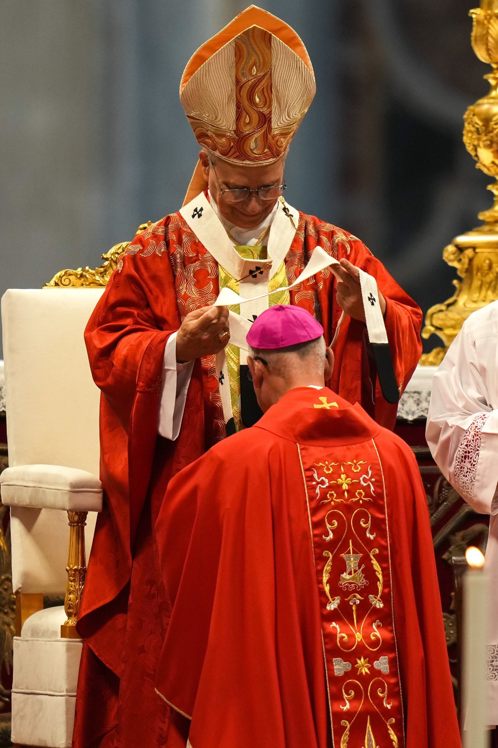 Archbishop Mark S. Rivituso of Mobile, Alabama, receives the pallium from Pope Leo XIV during Mass in St. Peter’s Basilica at the Vatican June 29, 2026, the feast of Sts. Peter and Paul. The pope blessed palliums for 35 new metropolitan archbishops, including four from the United States. (CNS photo/Lola Gomez)