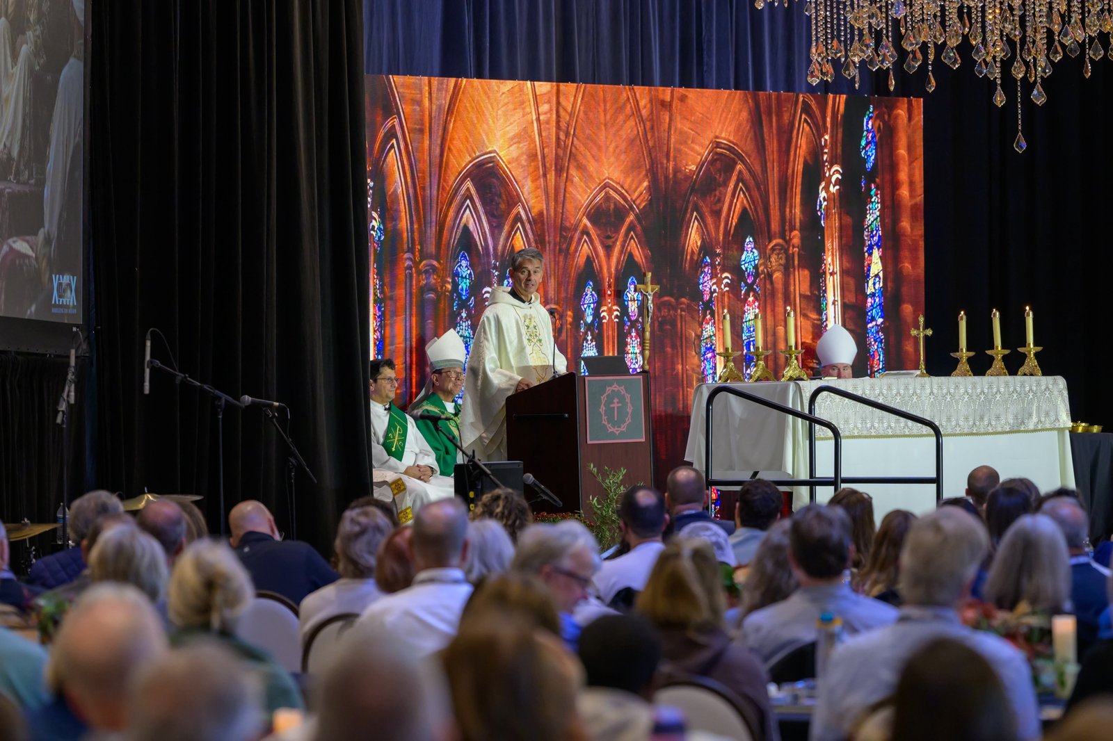 Fr. John Riccardo preaches during Mass at Saint John's.