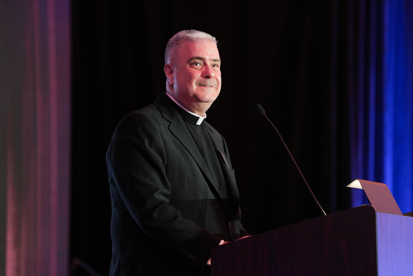Fr. Creagh speaks June 4 during the annual Archbishop's Gala to benefit Sacred Heart Major Seminary at St. John's Resort in Plymouth. Fr. Creagh said he began to be aware of God's calling in his life as a student at St. John's University in New York, where the Vincentian priests and brothers on campus made an impact on him. (John Martin | Courtesy of Sacred Heart Major Seminary)