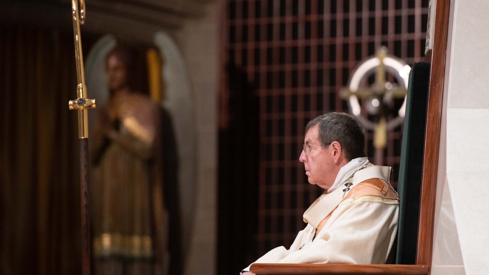 Archbishop Vigneron sits in his cathedra — his episcopal seat — at the Cathedral of the Most Blessed Sacrament during a Mass of consecration for two consecrated virgins on Sept. 25, 2021. (Tim Fuller | Special to Detroit Catholic)