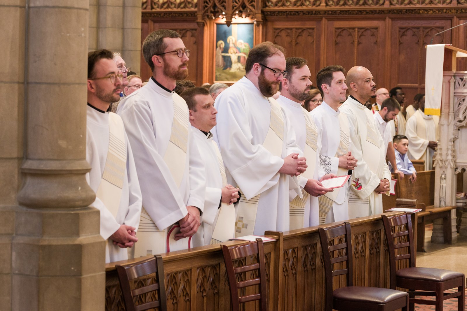 Fr. Ippel, third from right, hopes to use his education both from the Jesuits and Georgetown to better serve communities that have been divided.
