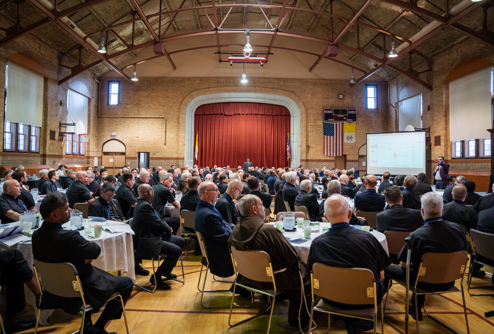More than 185 priests attend the first of a series of monthly meeting intended to help priests navigate the changes expected to the Archdiocese of Detroit's more than 200 parishes. As part of the restructuring process, the vast majority of priests will receive new assignments beginning July 1, 2027.