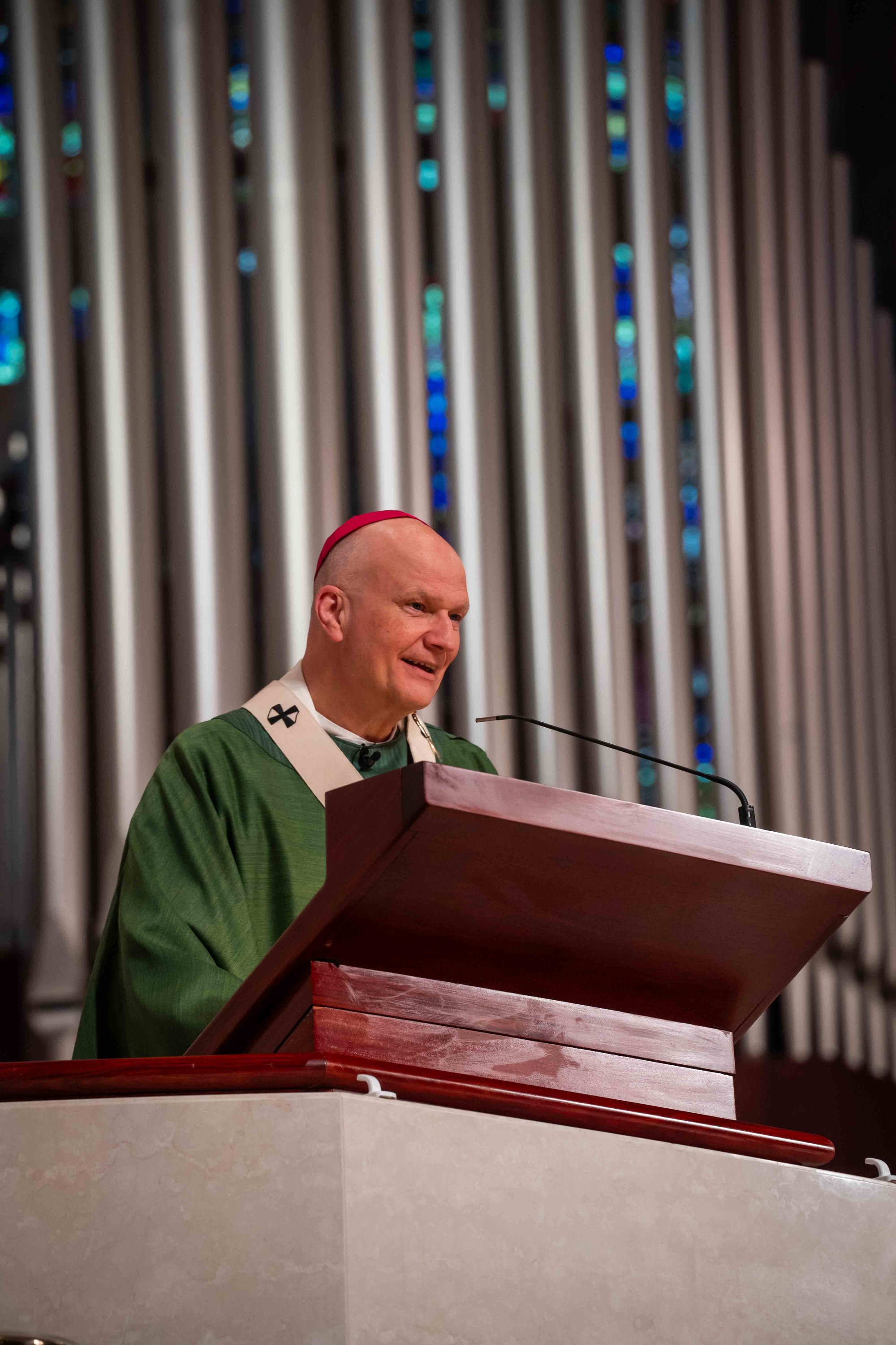 https://img.hghlnd.com/imgix/https://detroitcatholic.nyc3.digitaloceanspaces.com/261004_Strangers_No_Moss_Immigration_Mass_dc_vw-44.JPG