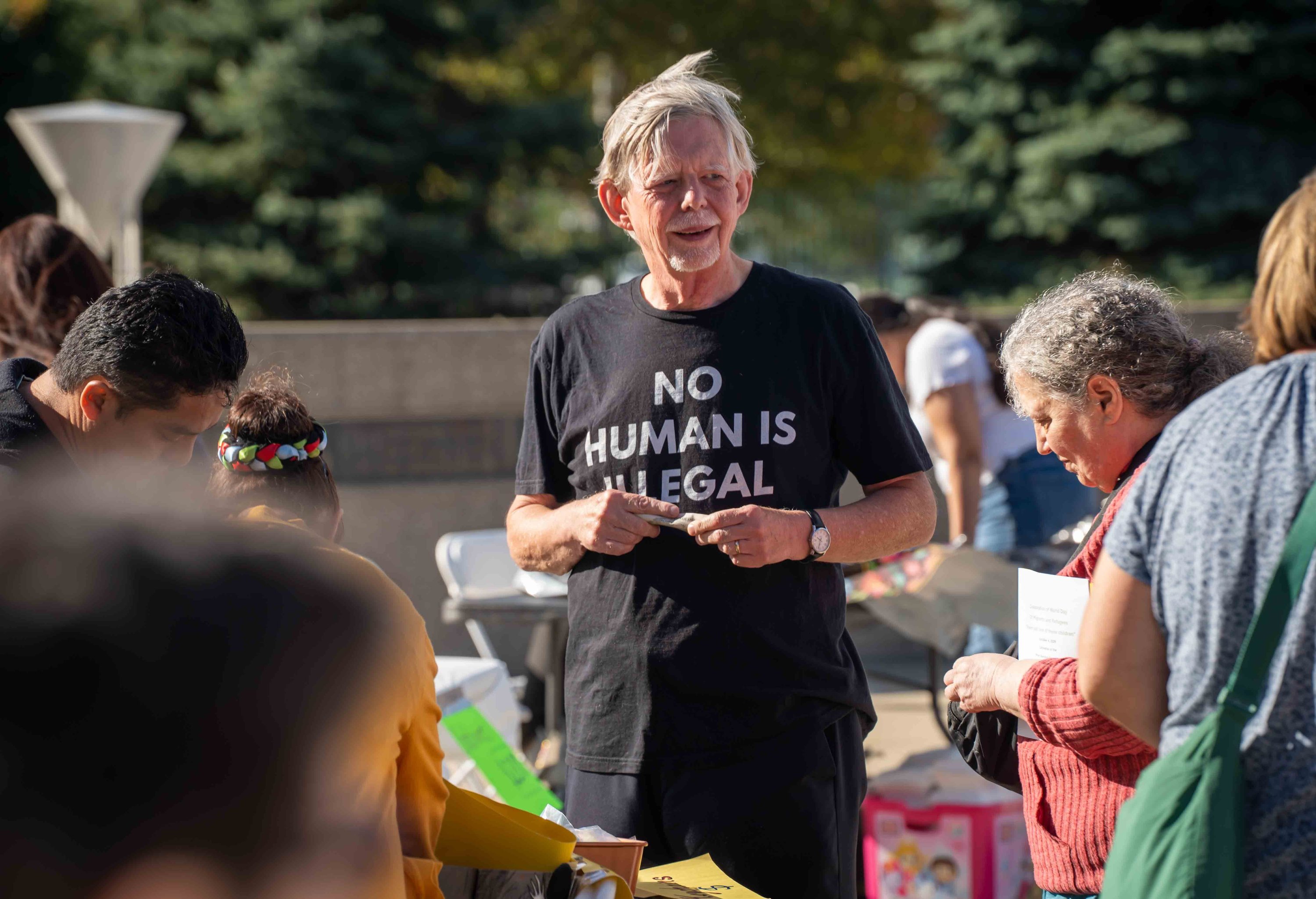 https://img.hghlnd.com/imgix/https://detroitcatholic.nyc3.digitaloceanspaces.com/261004_Strangers_No_Moss_Immigration_Mass_dc_vw-52.JPG