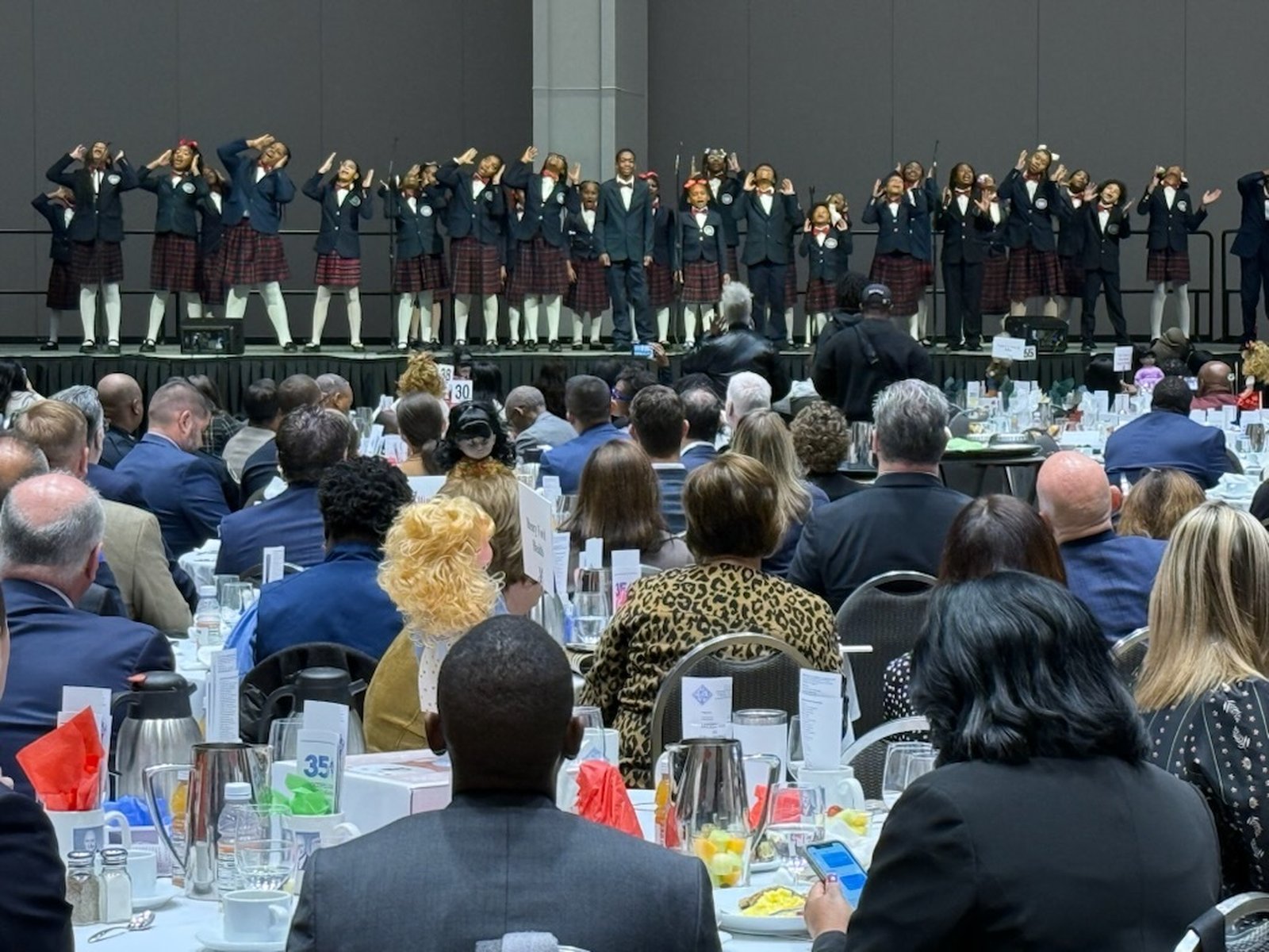 The Detroit Academy of Arts and Sciences choir, performs at the annual Detroit Goodfellows breakfast at Huntington Place in Detroit.