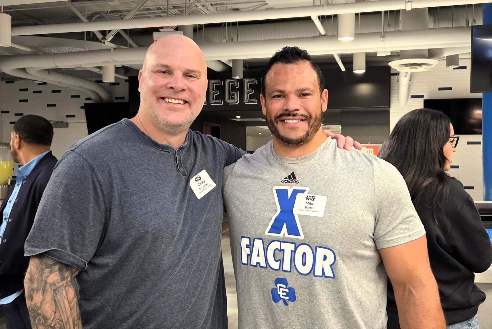 Detroit Catholic Central graduates Casey Rogowski and Mike Martin achieved success well beyond their days as Shamrock student-athletes. The duo caught up with one another at Ford Field on Oct. 24 as the Catholic High School League unveiled its 100 greatest athletes as part of its centennial celebration.