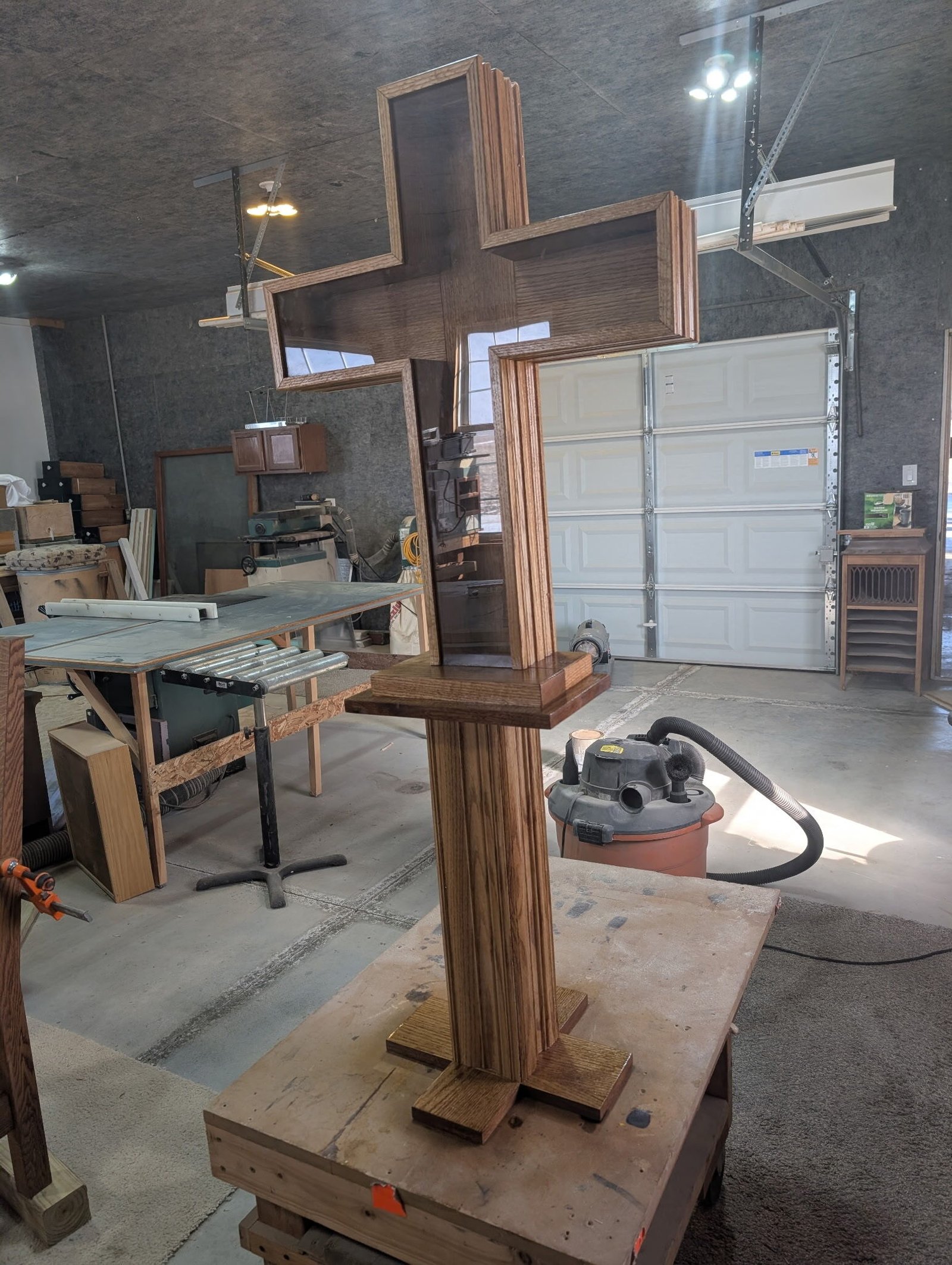 A “piggy bank cross” Almand made to raise money for the parish youth group and Sacred Heart Major Seminary. (Courtesy of Wilson Almand)
