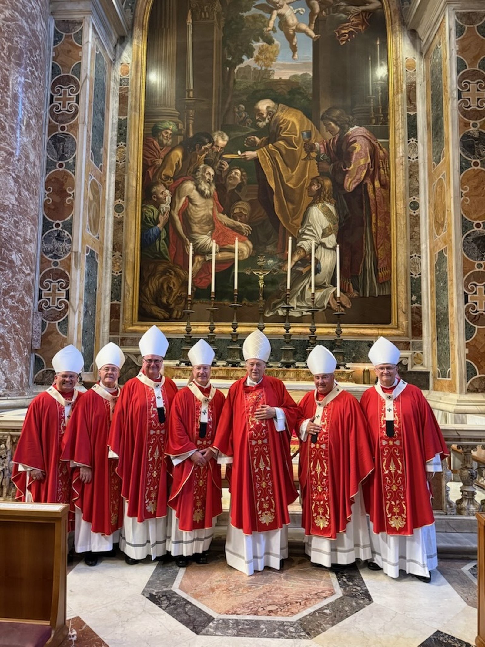 Seven of the eight U.S. archbishops who received their pallium from Pope Leo XIV, including Archbishop Edward J. Weisenburger, right, gather for a photograph shortly after the Mass on the Solemnity of SS. Peter and Paul, June 29, at St. Peter's Basilica at the Vatican.