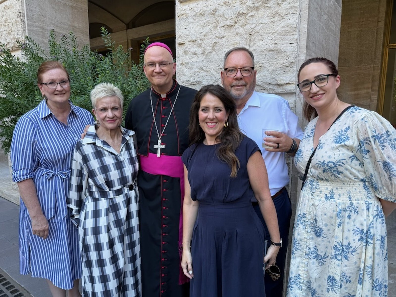 Members of Archbishop Weisenburger's family pose for a photo in Rome. Left to right are the archbishop's sisters, Adina Heller and Mary Jung, Archbishop Weisenburger, his niece Ashley Kastl, her father and the archbishop's brother-in-law, Don Jung, and the archbishop's niece, Jillian Heller.