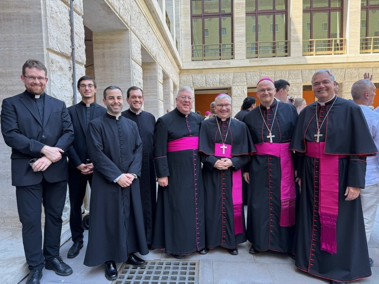 Detroit clergy gather in Rome to celebrate Archbishop Weisenburger's reception of the pallium. From left are Fr. David Tomaszycki, Fr. Ryan Asher, Fr. Mario Amore, Fr. Jeffrey Day, Msgr. Charles Kosanke, Auxiliary Bishop Jeffrey M. Monforton, Archbishop Weisenburger and Auxiliary Bishop Robert J. Fisher.