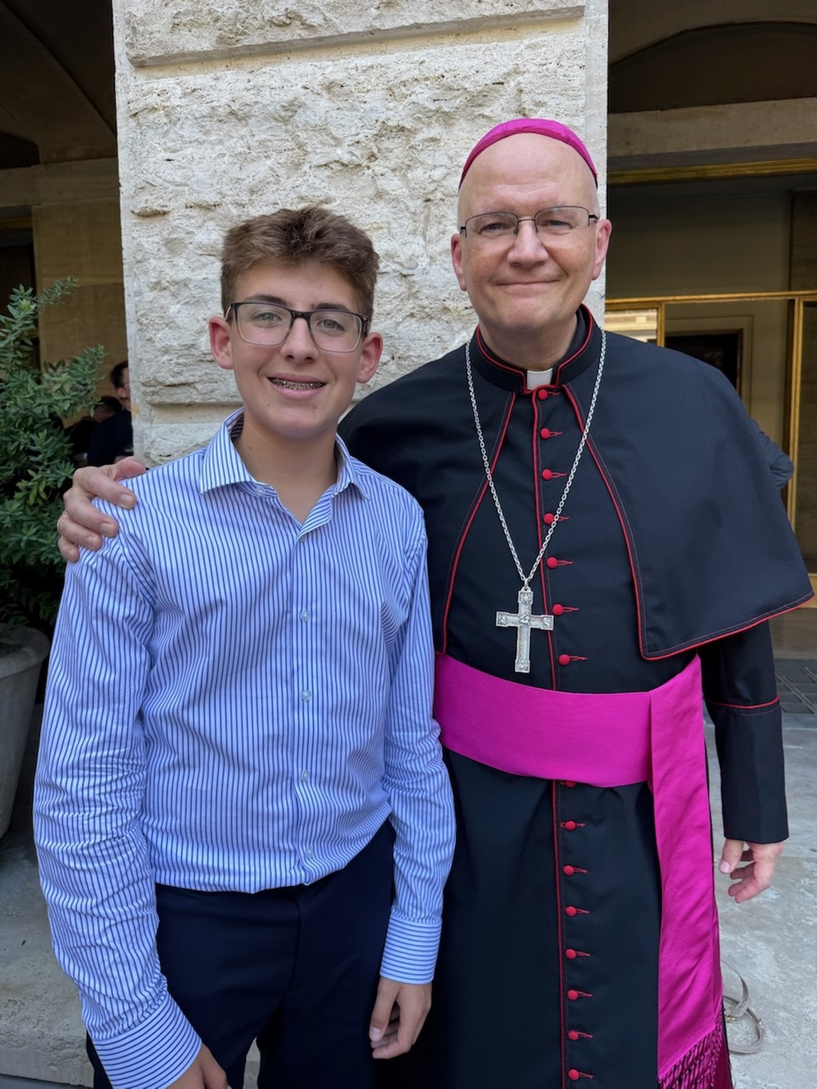 Archbishop Weisenburger with his grand-nephew, Cooper Kastl.