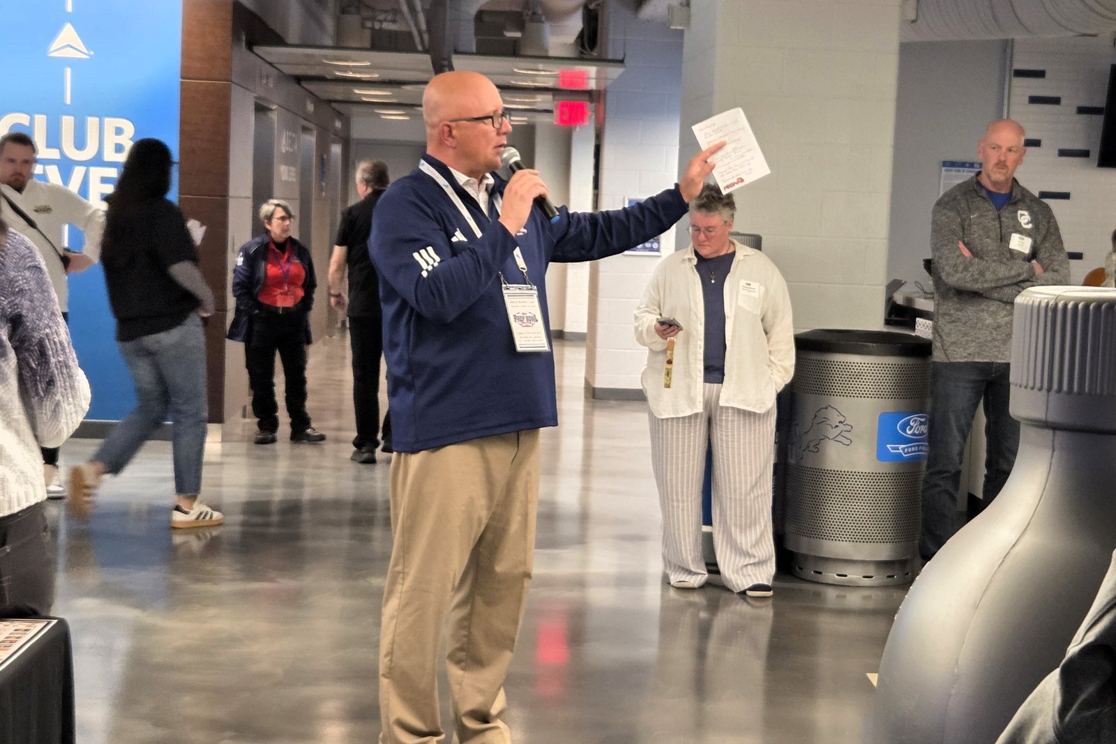 Prior to the athletes taking the field, CHSL director Mike Evoy addresses the crowd gathered at the 100 Greatest Athletes reception Oct. 24 at Ford Field in Detroit.