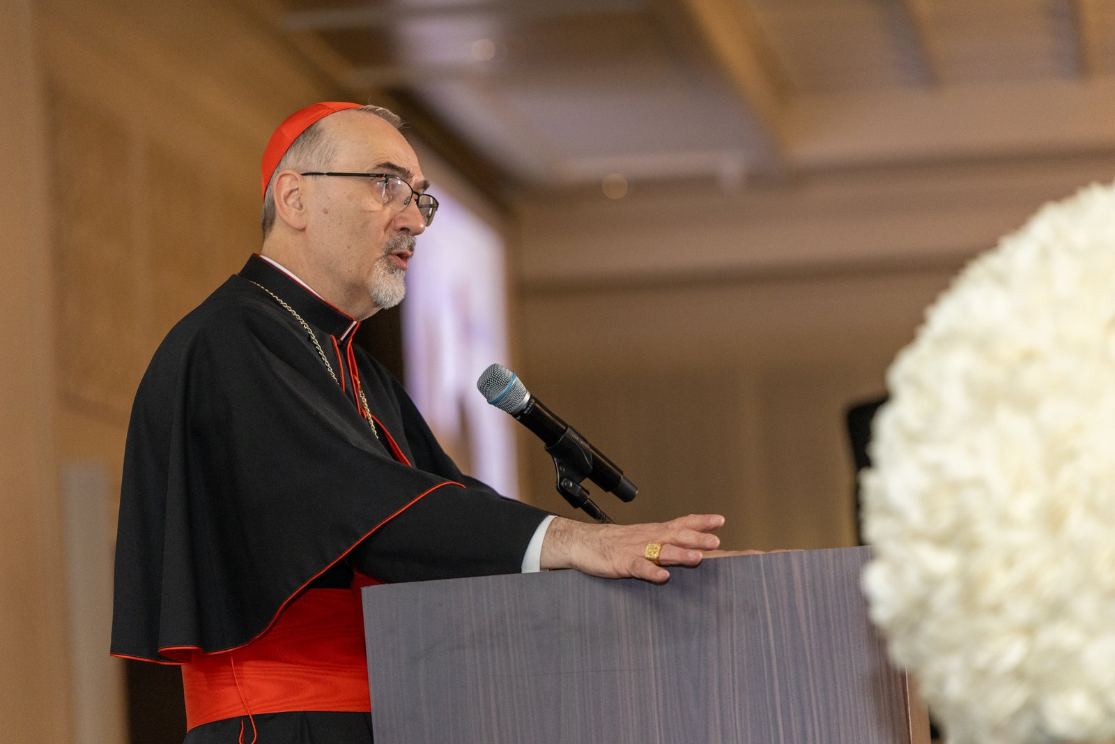 Cardinal Pizzaballa speaks Dec. 4 at the Shenandoah Country Club in West Bloomfield during a fundraising dinner for Christians in the Holy Land. "No one, I repeat, no one in Gaza now is living where they were before the war," the cardinal said.