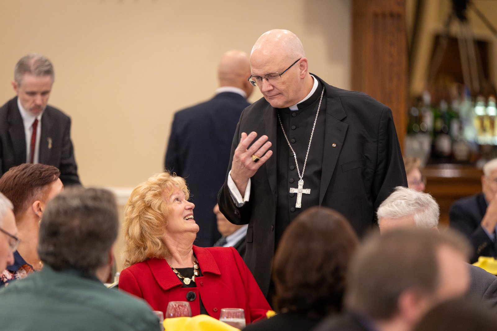 Archbishop Weisenburger greets attendees of the 48th annual Respect Life Benefit Dinner, where he shared his own story about how he became more aware of the pro-life cause as a high school student and the Church's teachings regarding life.