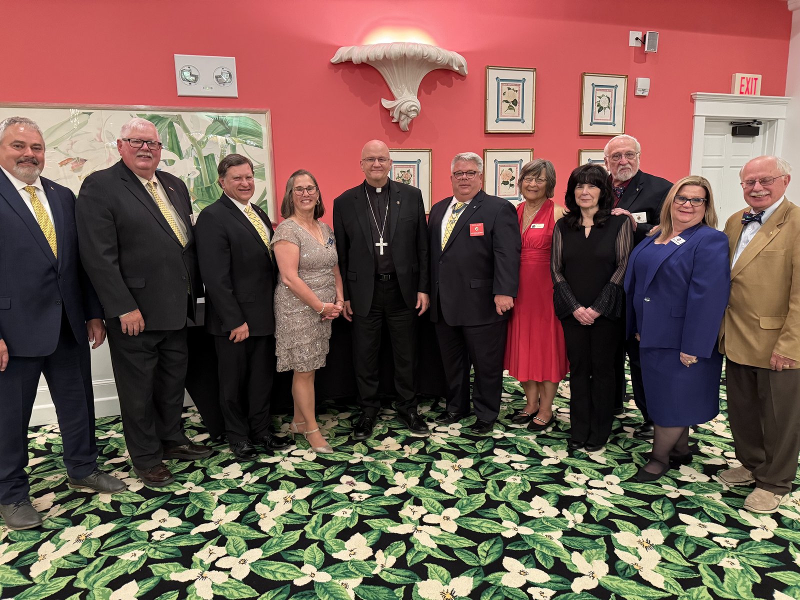Archbishop Edward J. Weisenburger, himself a fourth-degree member of the Knights of Columbus, greets past Michigan state deputies and their wives gathered on Mackinac Island for the 2025 Knights of Columbus state convention. The annual convention brings together Knights from across the state on the northern Michigan island, held at the Grand Hotel.
