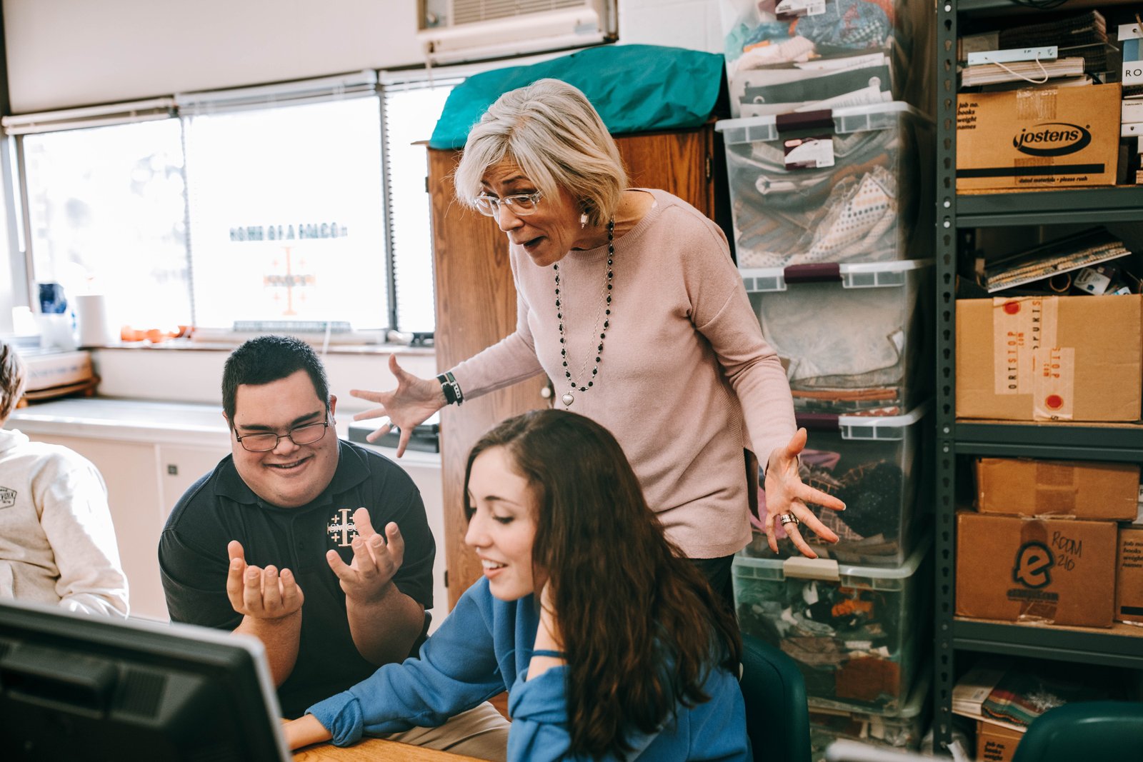 Jacob Goda, left, was one of two students when the inclusion program at St. Mary Catholic Central launched in 2018, when this picture was taken. As of 2026, the program has seven students in total. After graduating from college, Goda now has a job at St. Mary Catholic Central. (Detroit Catholic file photo by Naomi Vrazo)