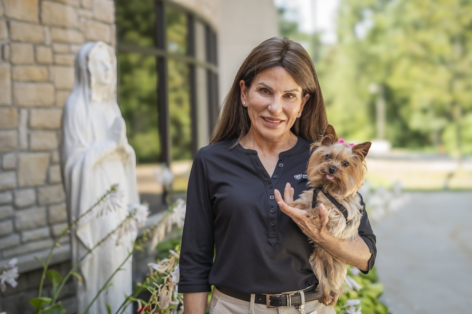 Colleen Mott has volunteered at Angela Hospice for three years after retiring from the Troy Police Department, offering spiritual companionship and pet therapy.