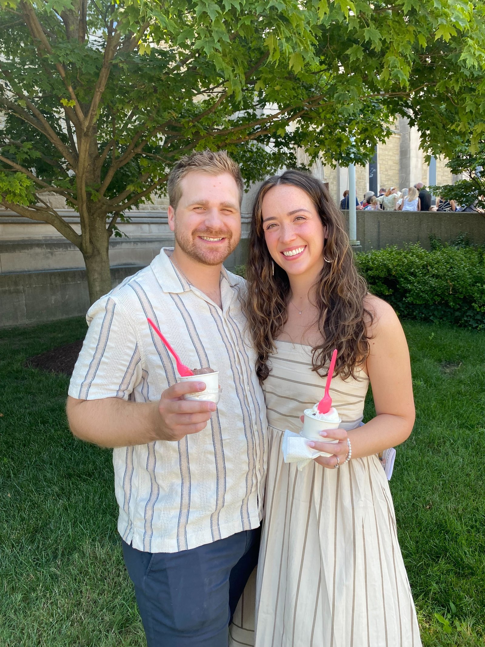 Erik and Sarah Mitra of Our Lady of Good Counsel Parish in Plymouth enjoy a treat from MJ’s North End Ice Cream Parlor. The couple were married at the cathedral eight months ago.