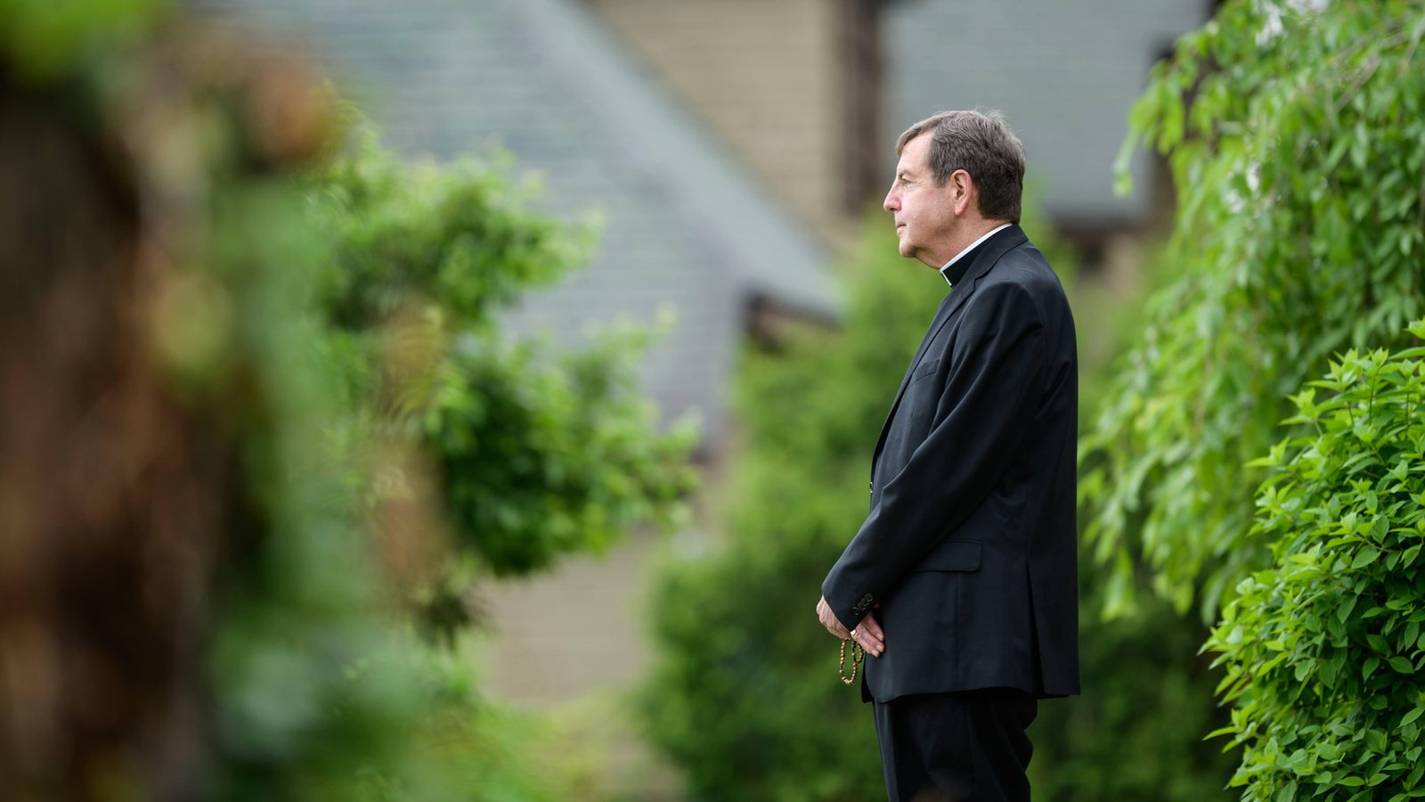 Archbishop Vigneron takes a moment of contemplation outside his residence in Detroit. (Marek Dziekonski | Special to Detroit Catholic)