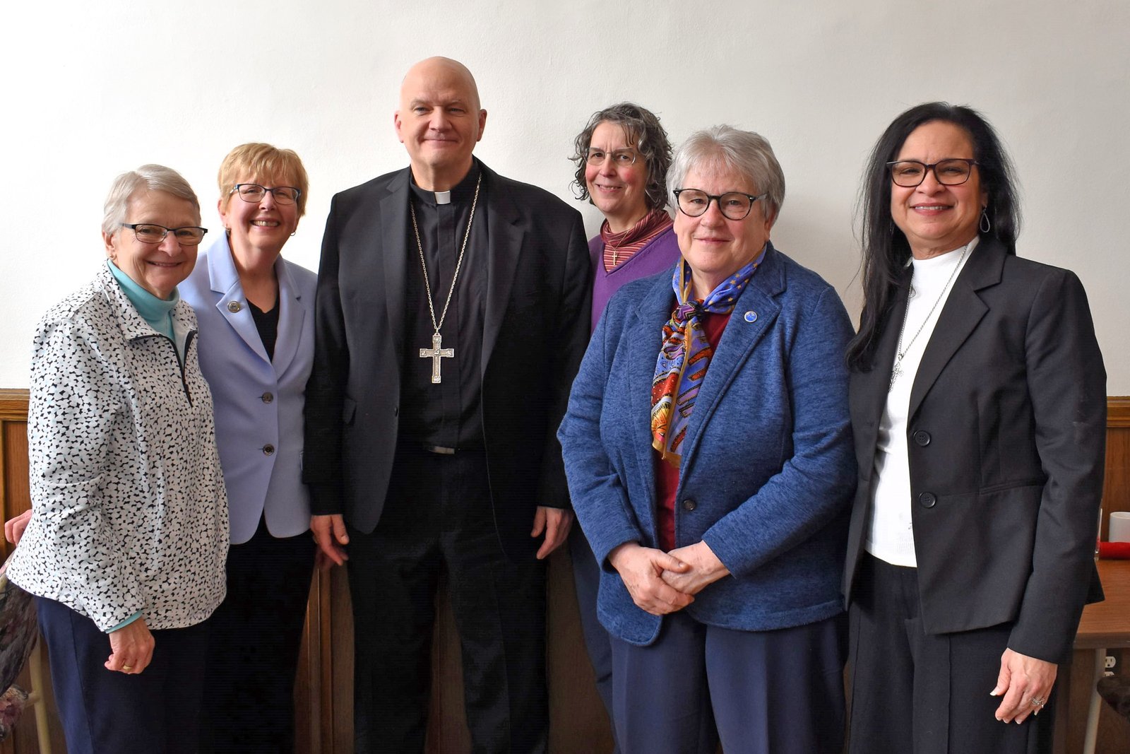Archbishop Weisenburger is pictured with the leadership team of the Monroe-based Sisters, Servants of the Immaculate Heart of Mary.