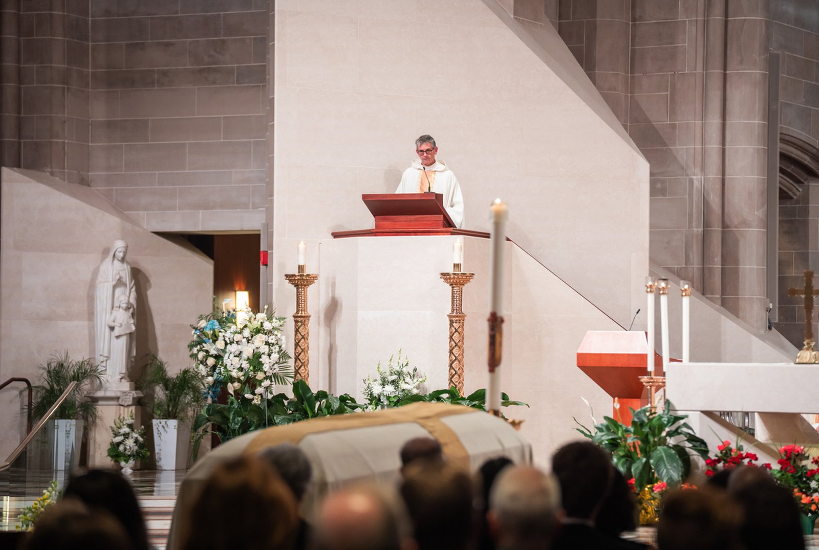 Fr. John Riccardo, executive director of ACTS XXIX and an ordination classmate of Archbishop Byrnes, delivers the homily during the archbishop's funeral Mass on June 9.