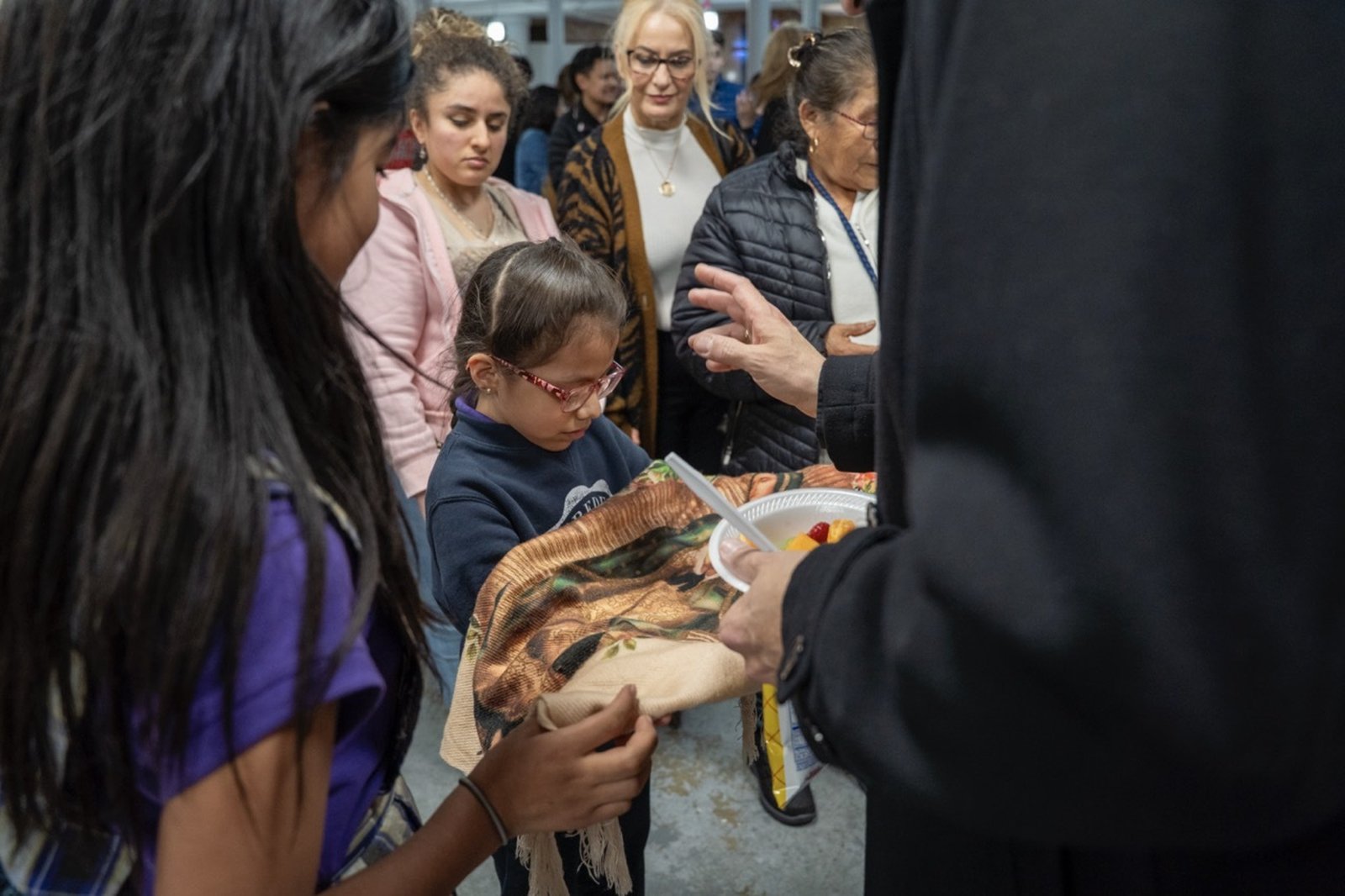 The new archbishop was greeted by families, parishioners, staff members and school children, who were excited to wear their uniforms and meet Archbishop Weisenburger for the first time.