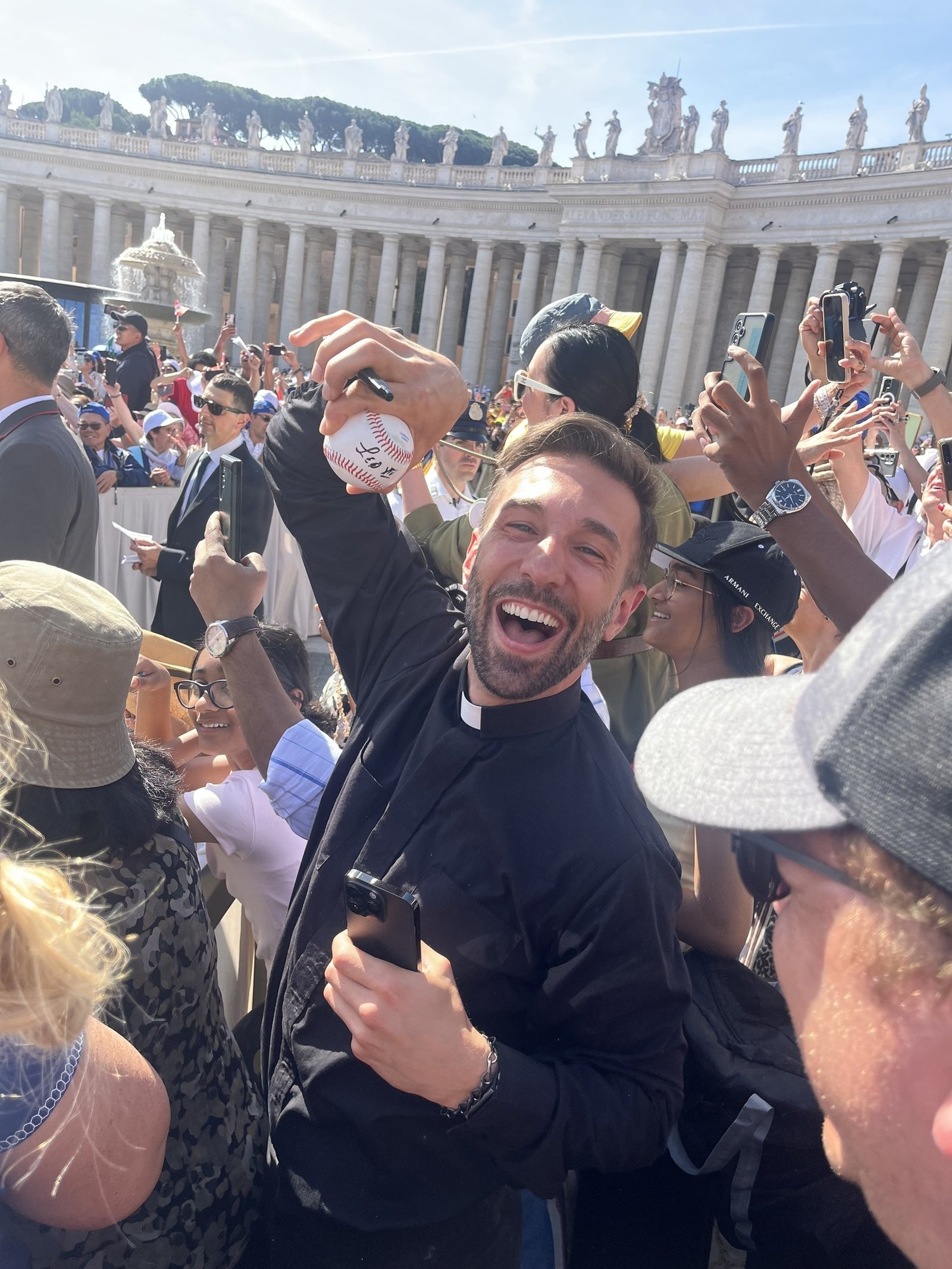 Lansing seminarian Jonathan Galvas excitedly holds up a baseball he and other seminarians had autographed by Pope Leo XIV during a general audience in St. Peter's Square on June 4. (Photos courtesy of Jonathan Galvas)