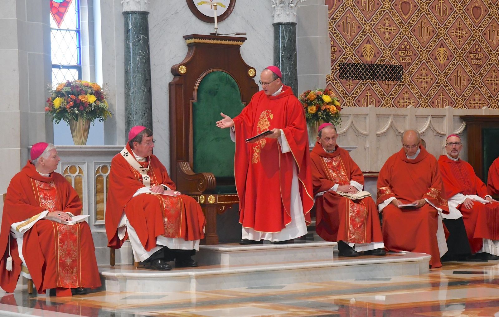 Bishop Lohse addresses the faithful and his brother bishops in his remarks of gratitude after being ordained and installed as the fifth bishop of Kalamazoo. Bishop Lohse, 61, succeeds Bishop Paul J. Bradley, 77, left, who has served the diocese since 2009.  (John Grap | Diocese of Kalamazoo)