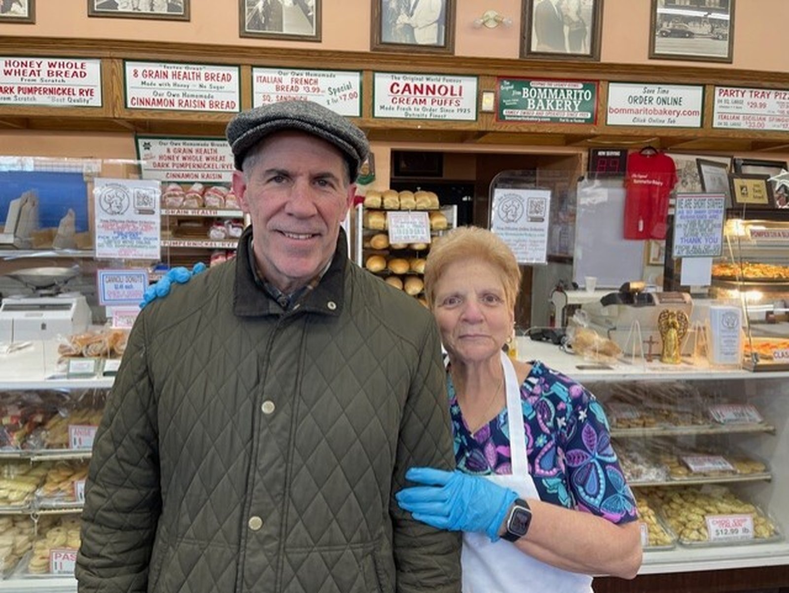 Archbishop Byrnes visits Bommarito Bakery in St. Clair Shores. St. Joan of Arc parishioners would accompany Archbishop Byrnes on errands throughout town, saying he brightened everyone's mood when he visited. (Photo courtesy St. Joan of Arc Parish)