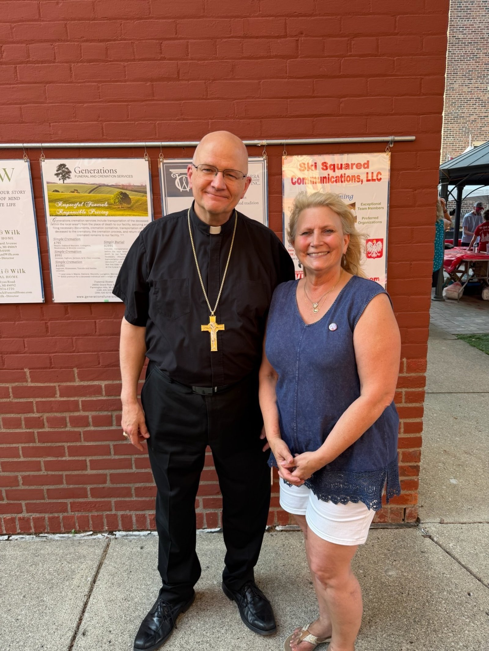 Archbishop Weisenburger with Marianne Peggie, longtime business manager at Sweetest Heart of Mary and a key volunteer with the Pierogi Festival.