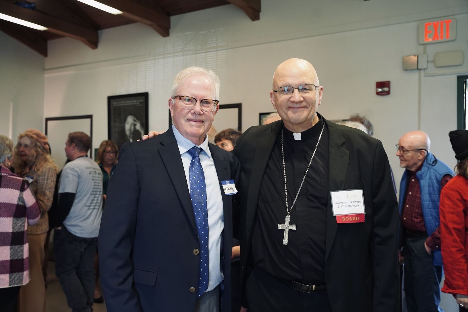 Archbishop Weisenburger is pictured with Dr. Karl Kolbe, the volunteer medical director of the Cabrini Clinic.