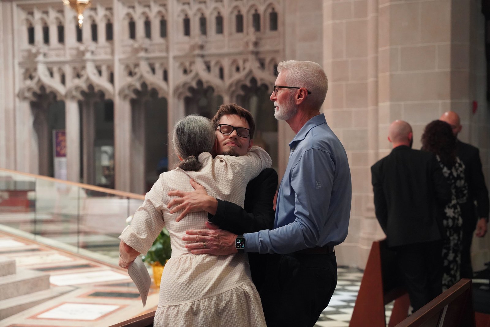 Jonathan Forrest, a seminarian for the Archdiocese of Detroit, embraces his mother after declaring his candidacy for Holy Orders to Archbishop Weisenburger. In addition to deepening his discernment into the priesthood, Forrest said he's traded in his bow ties for a Roman collar following the Candidacy Mass.