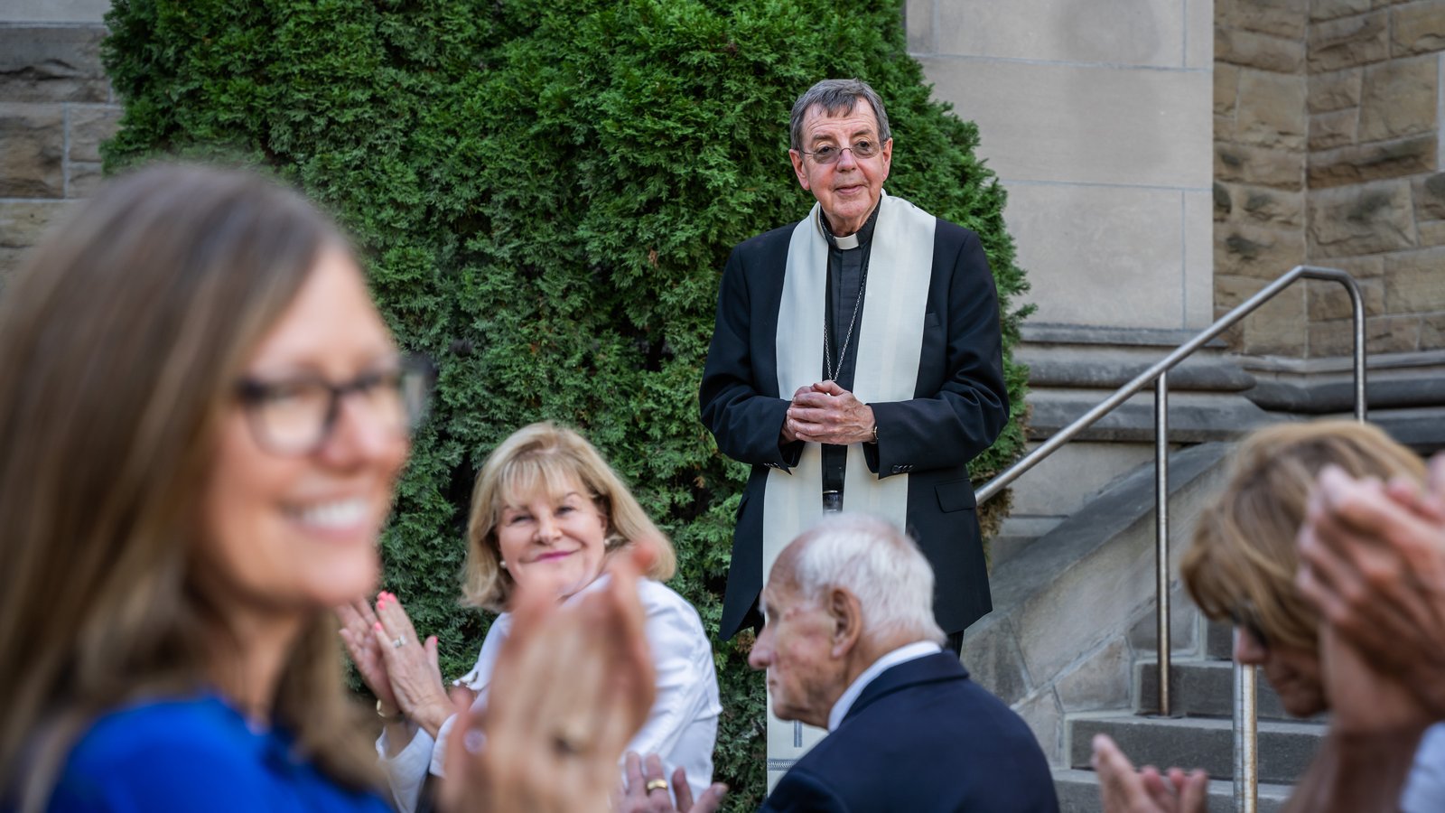 Archbishop Vigneron smiles during a blessing of a new grotto dedicated to Our Lady of Lourdes at the Cathedral of the Most Blessed Sacrament on Oct. 3, 2023. At the start of the COVID-19 pandemic, the archbishop pledged to build a grotto "as a lasting token of our gratitude" for the Blessed Virgin Mary's protection and a "perpetual reminder" of her care for the Archdiocese of Detroit. (Valaurian Waller | Detroit Catholic)