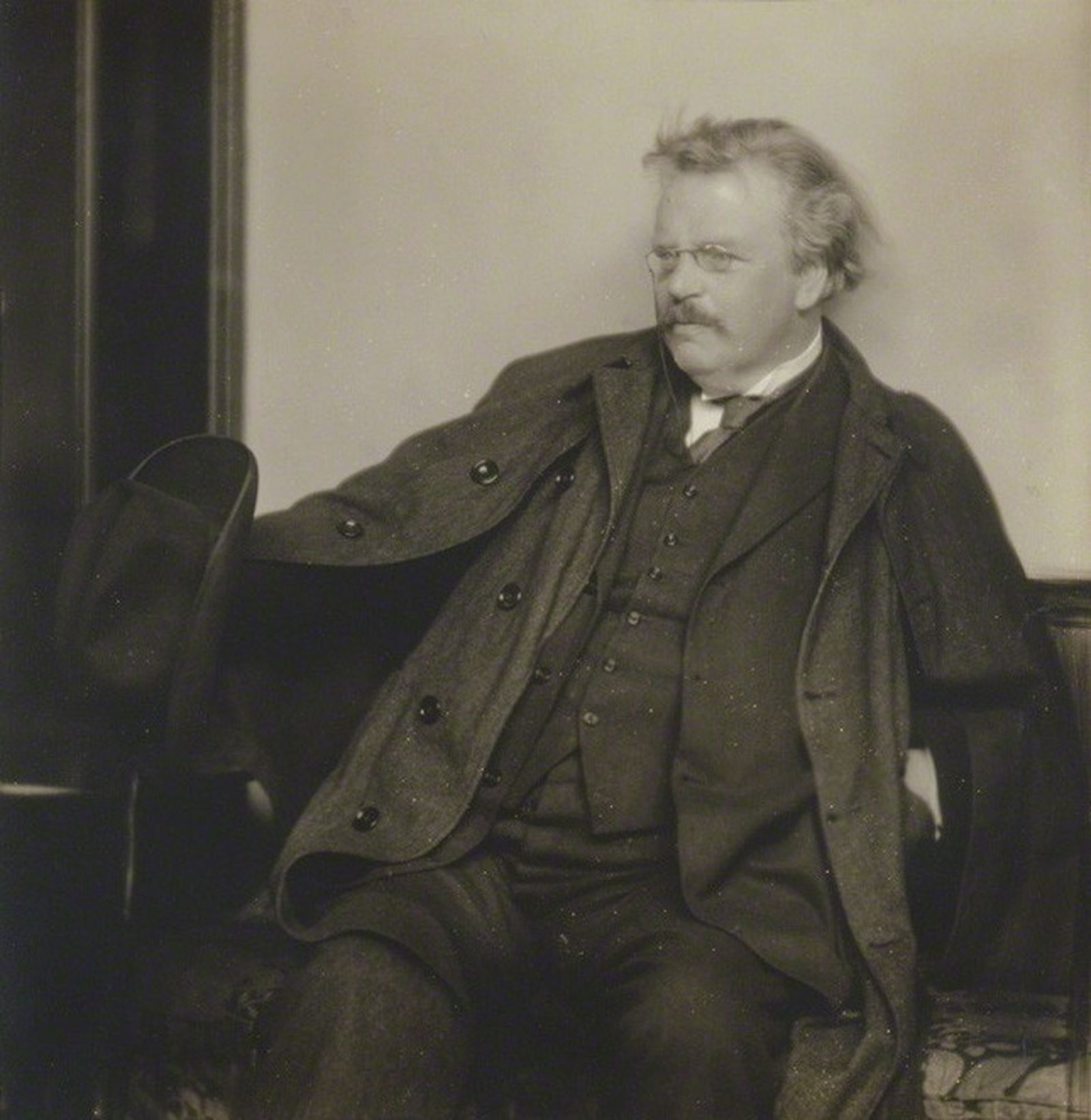 Chesterton enjoyed debating various topics with friends and colleagues at the pub. He was a particular collector of friends of various different backgrounds and perspectives, something the Southeast Michigan Chesterton Society strives to do in its monthly meetings. (Herbert Lambert, Public domain, via Wikimedia Commons)