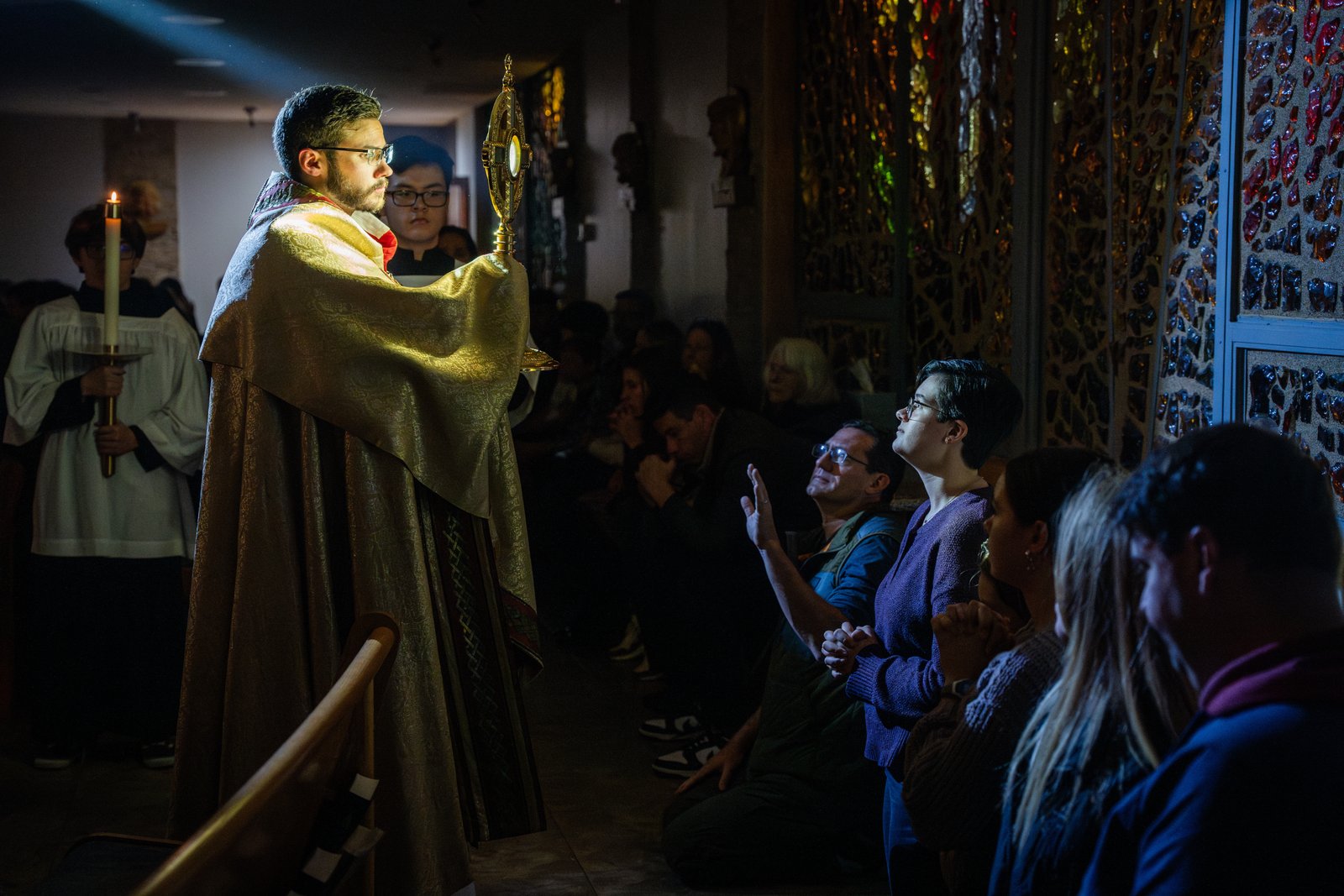 Fr. Jeremy Schupbach holds the monstrance containing the Blessed Sacrament during a "Come, Encounter Christ" event at Christ Our Light Parish in Troy on Oct. 22, 2023. As the U.S. Church prepares for the National Eucharistic Revival, which will take place July 17-21 in Indianapolis, Catholics in the Archdiocese of Detroit will have several opportunities to grow closer to Jesus throughout the coming weeks.