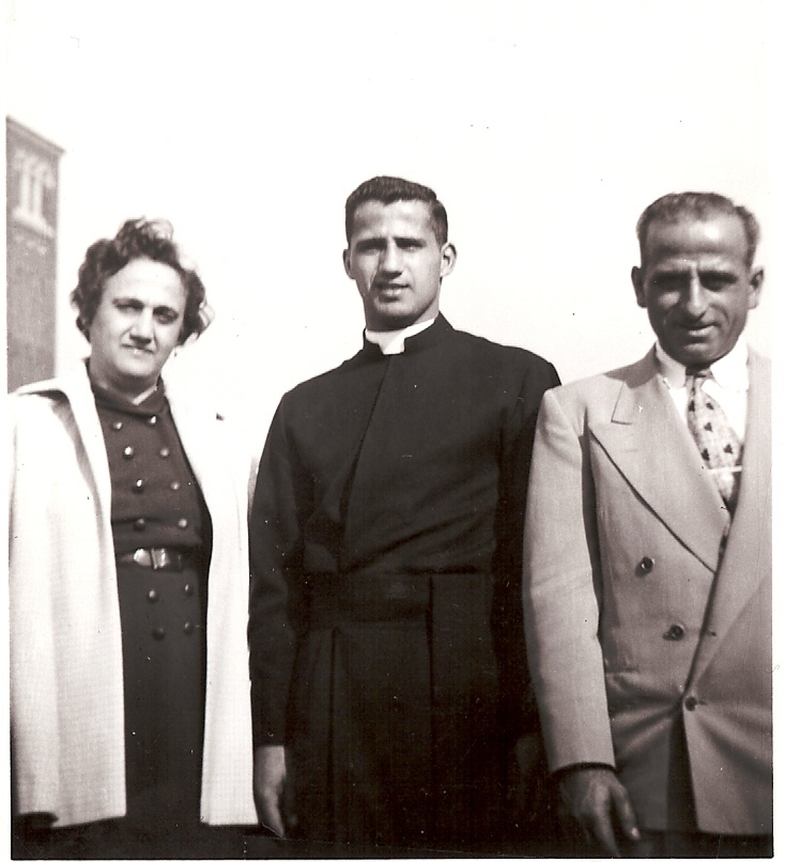 Fr. Norman Thomas, pictured with his parents, was born Dec. 18, 1930, in Highland Park and grew up at Madonna Parish in Detroit (now St. Moses the Black Parish). Thomas graduated from Sacred Heart Seminary High School and College before heading to St. John’s Provincial Seminary in Plymouth. He was ordained a priest by Cardinal Edward A. Mooney of Detroit on June 4, 1955. (Photo courtesy of Sacred Heart Parish)