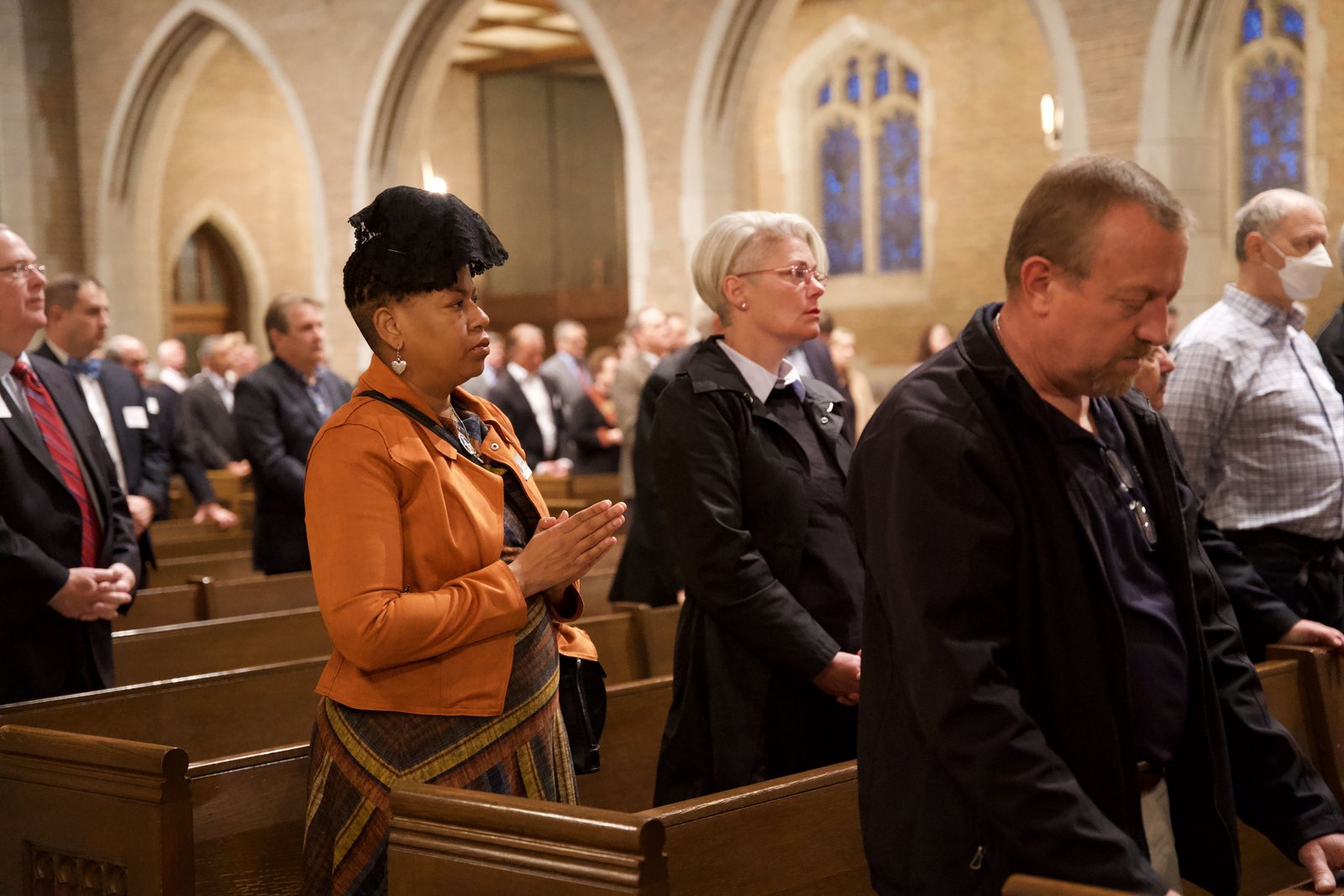 Catholic businessmen and women pray together in Sacred Heart's chapel.