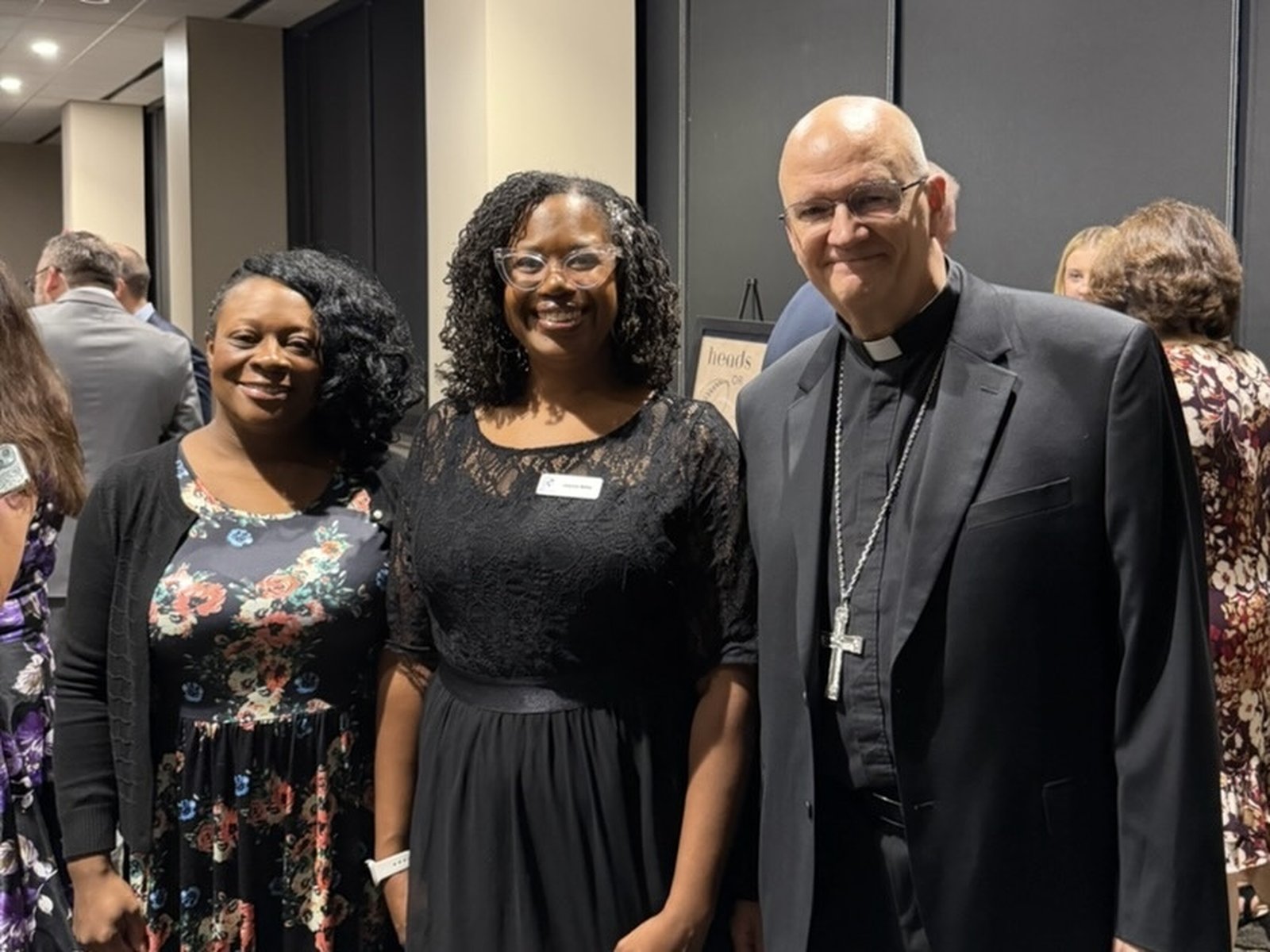 Joanna Willis, center, program manager of aftercare at Mary’s Mantle, helps women in the residential program adjust to life as a new mother, along with the nonprofit’s other dedicated staff.