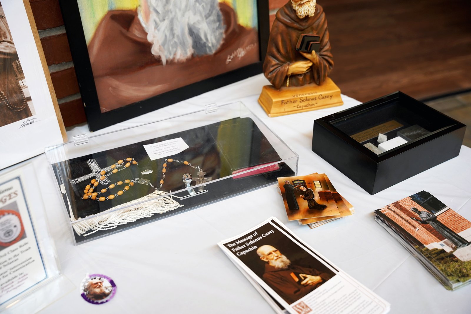 In addition to the educational panels, the traveling museum includes displays of Blessed Solanus Casey's personal belongings, such as rosaries and prayer books.