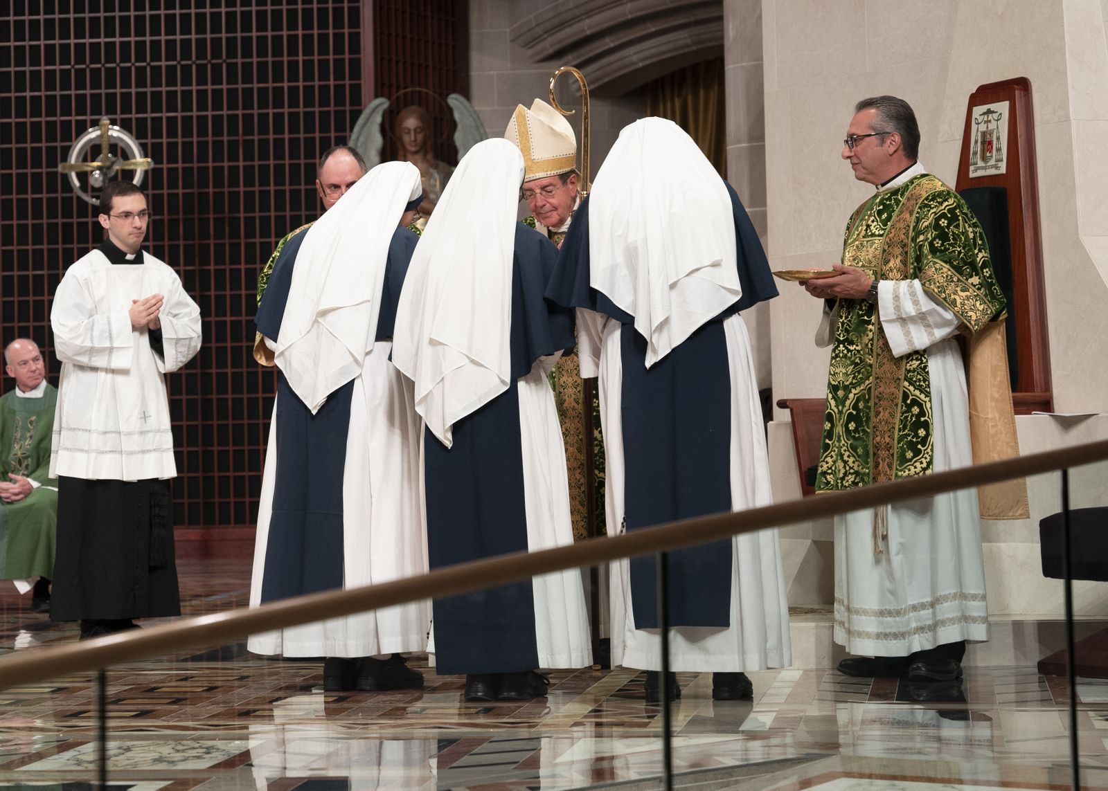 Members of the Sisters of Life, a religious community dedicated to the protection of life, present the gifts to Archbishop Vigneron on Oct. 1 during the archdiocese’s annual Mass for Life at the Cathedral of the Most Blessed Sacrament.