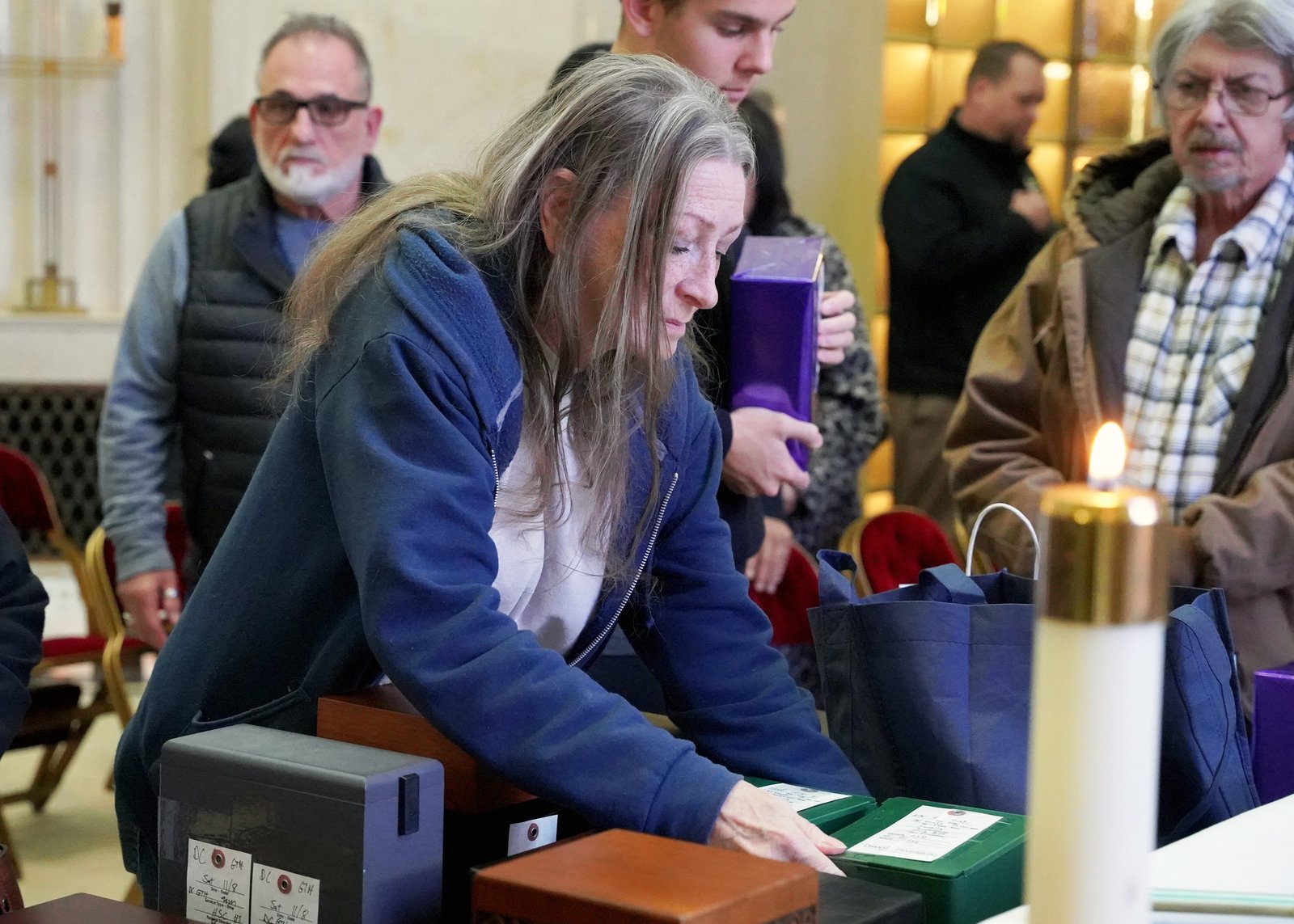 Families were invited to walk with their loved ones' remains to their final resting place in the All Souls Remembrance Room.