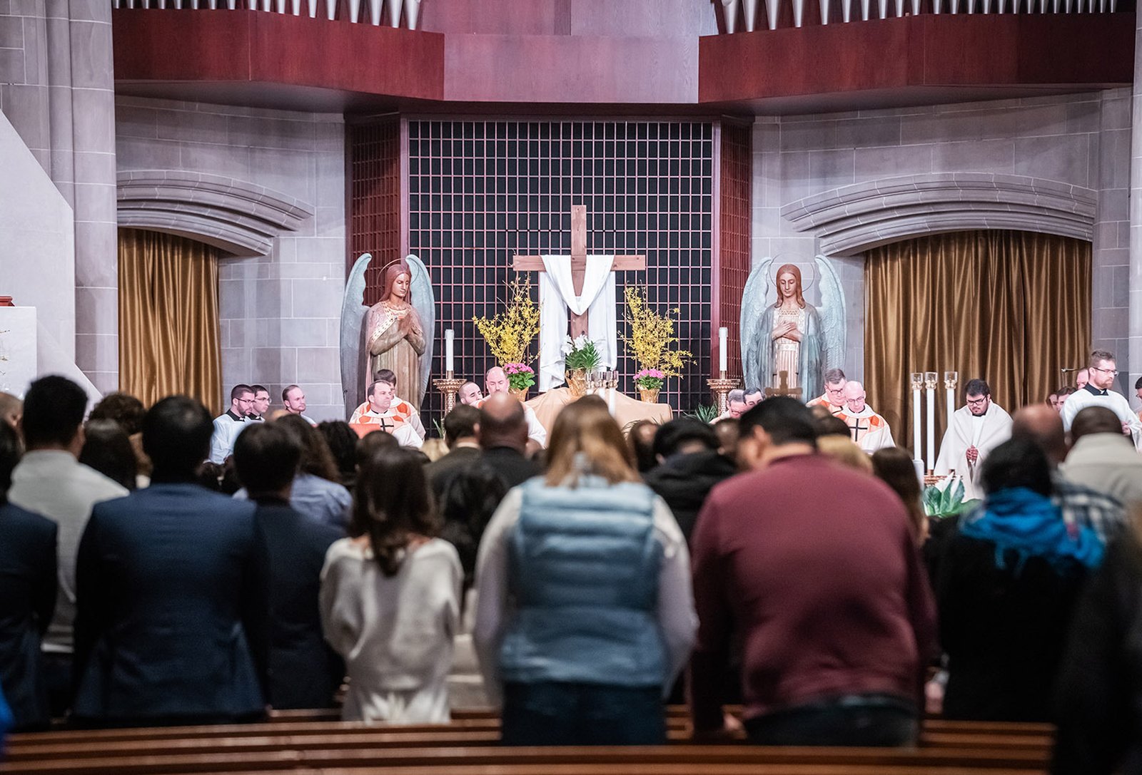 Jesus’s rising from the dead “dispelled wickedness, washed faults away, restored innocence to the fallen and joy to mourners, drove out hatred, fostered, conquered and brought down the mighty,” Archbishop Vigneron said.