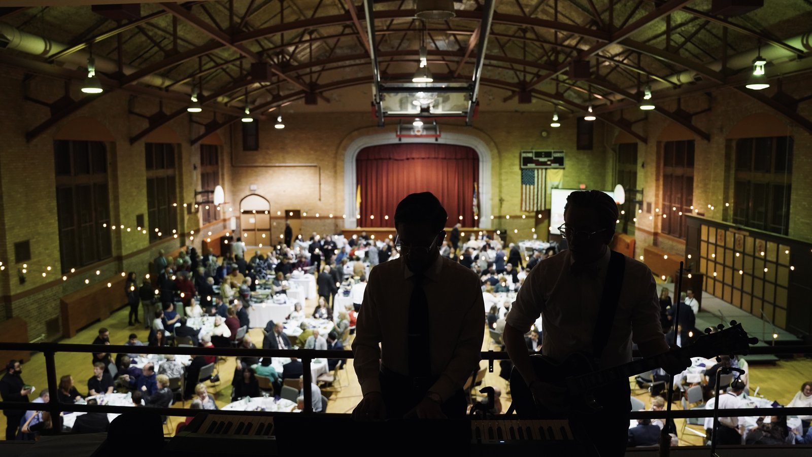 While some seminarians worked in the kitchen, stocked food or waited tables, others provided music from the gymnasium's loft as guests ate.
