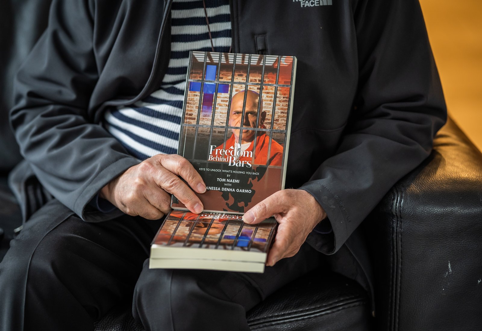 In his book, Naemi tells his own story of healing and forgiveness, and encourages readers to let go of their own "prisons" in life, those of fear, anger, revenge and sin.